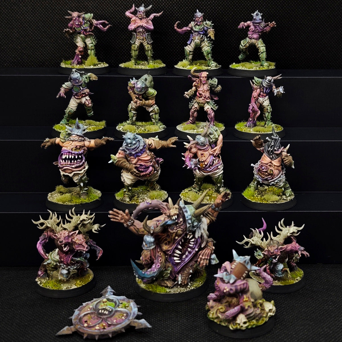 Fantasy Football tabletop miniatures featuring the Children of Contagion team with Rottens, Goats, and Warriors.