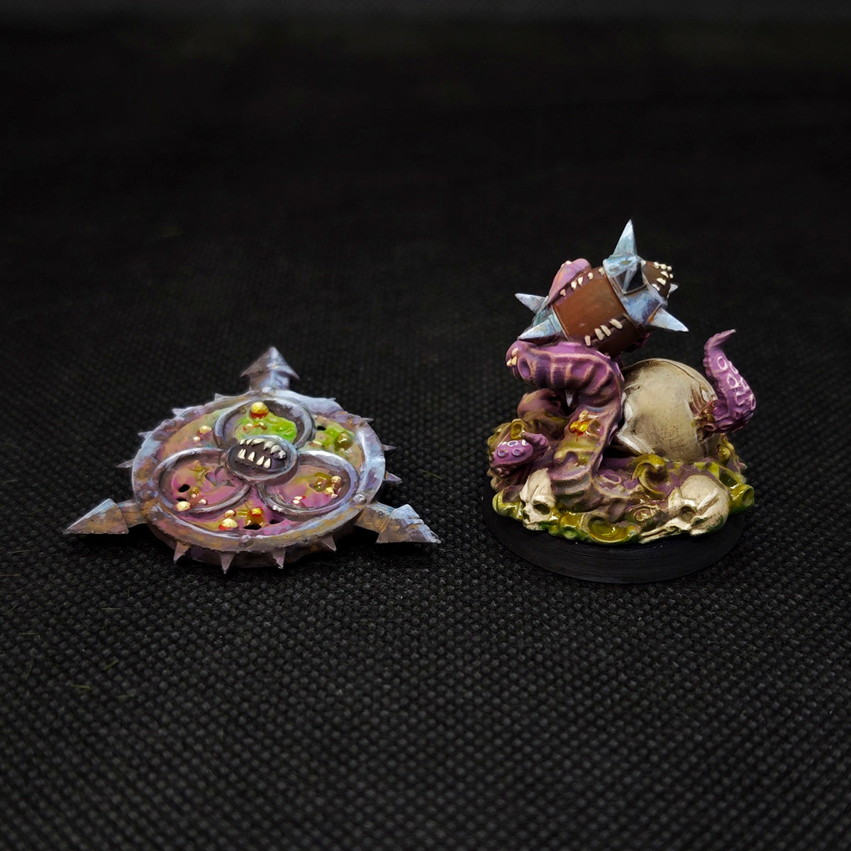 Fantasy football tabletop miniatures featuring Rotspawn and RR Marker for the Children of Contagion team.
